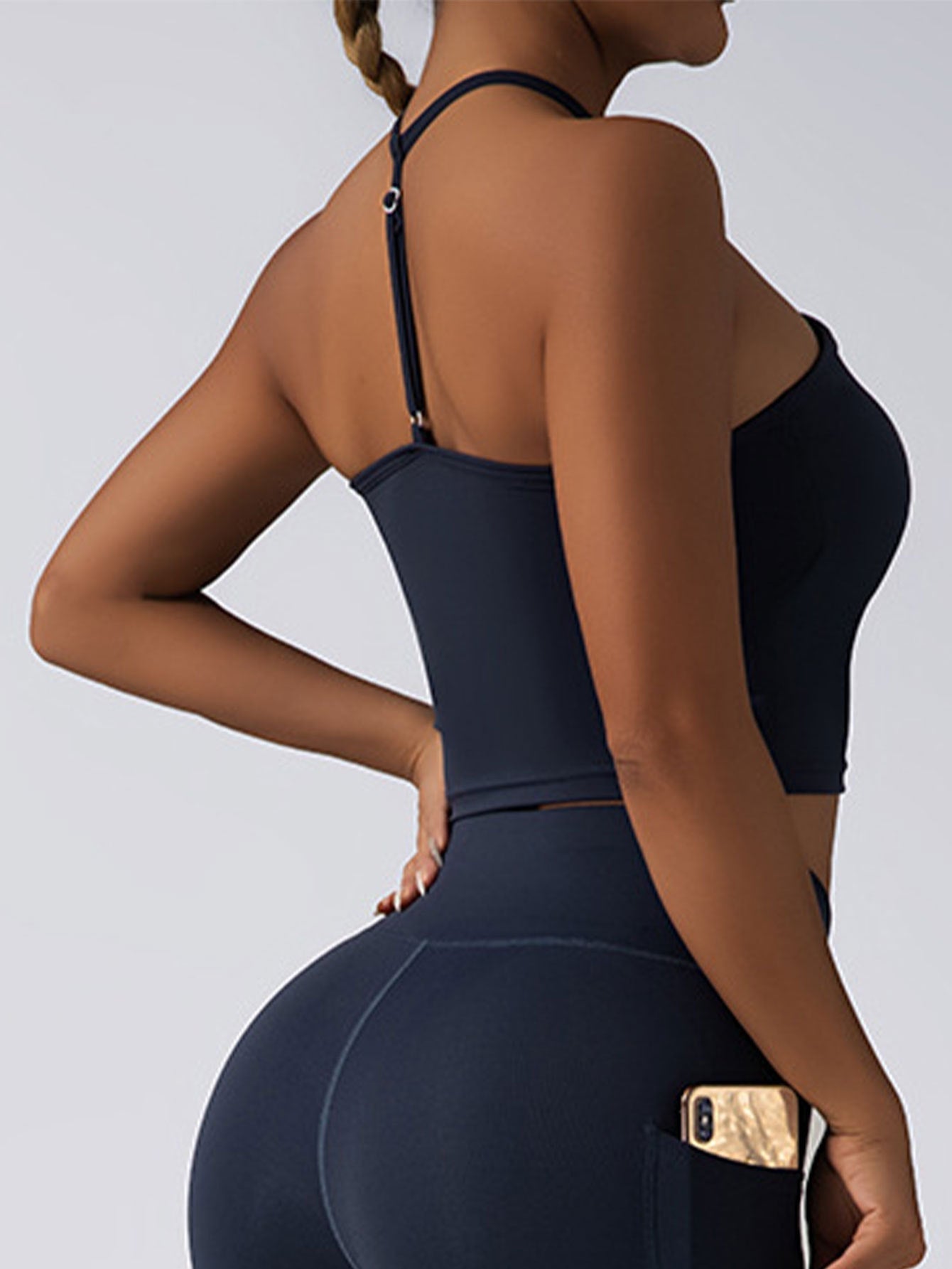 Plush Fashion Hub padded crop top sports bra with push-up support, seamless gym tank for women, activewear for workout and fitness.