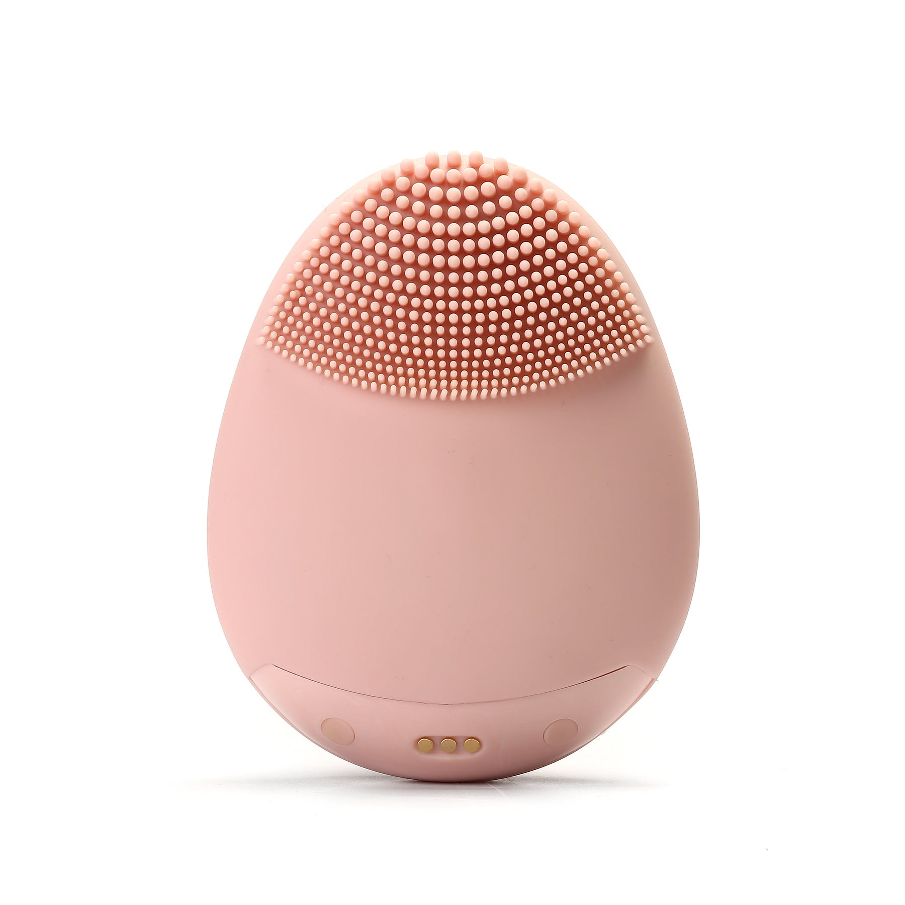 Pale pink Timeless Facial Cleansing Brush device from Timeless Organics Skin Care with soft bristles for gentle facial cleansing.