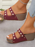 Women's pearl-embellished wedge sandals by Trendsi featuring comfortable mid-heel design and elegant dress shoe style.