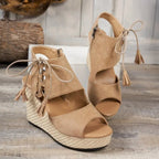 Tan Bohemian peep-toe lace-up wedge sandals with tassel details, stylish Trendsi shoe perfect for casual summer wear.