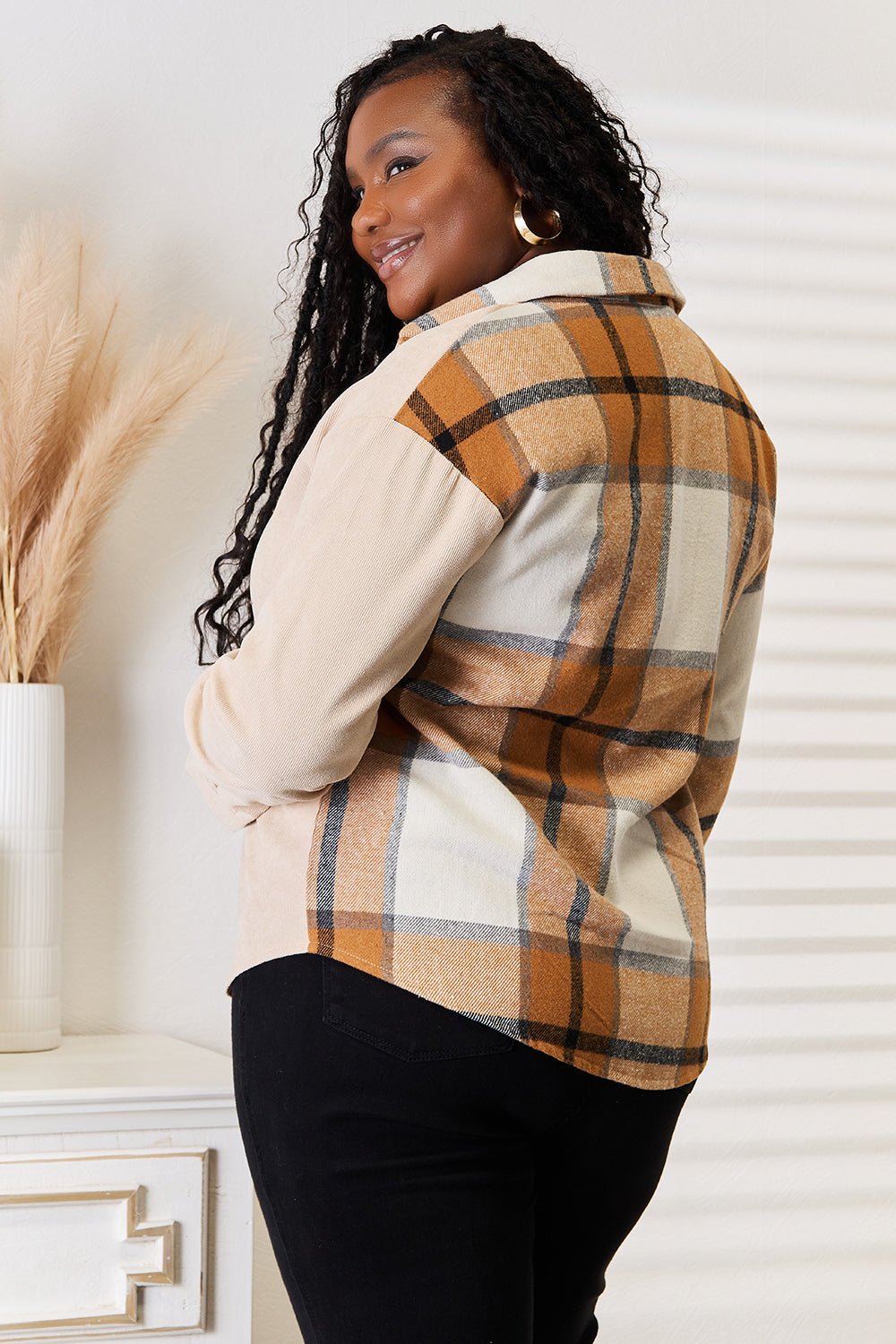 Women's casual plaid long sleeve shirt with dropped shoulders by Trendsi, featuring a relaxed fit and classic plaid pattern.