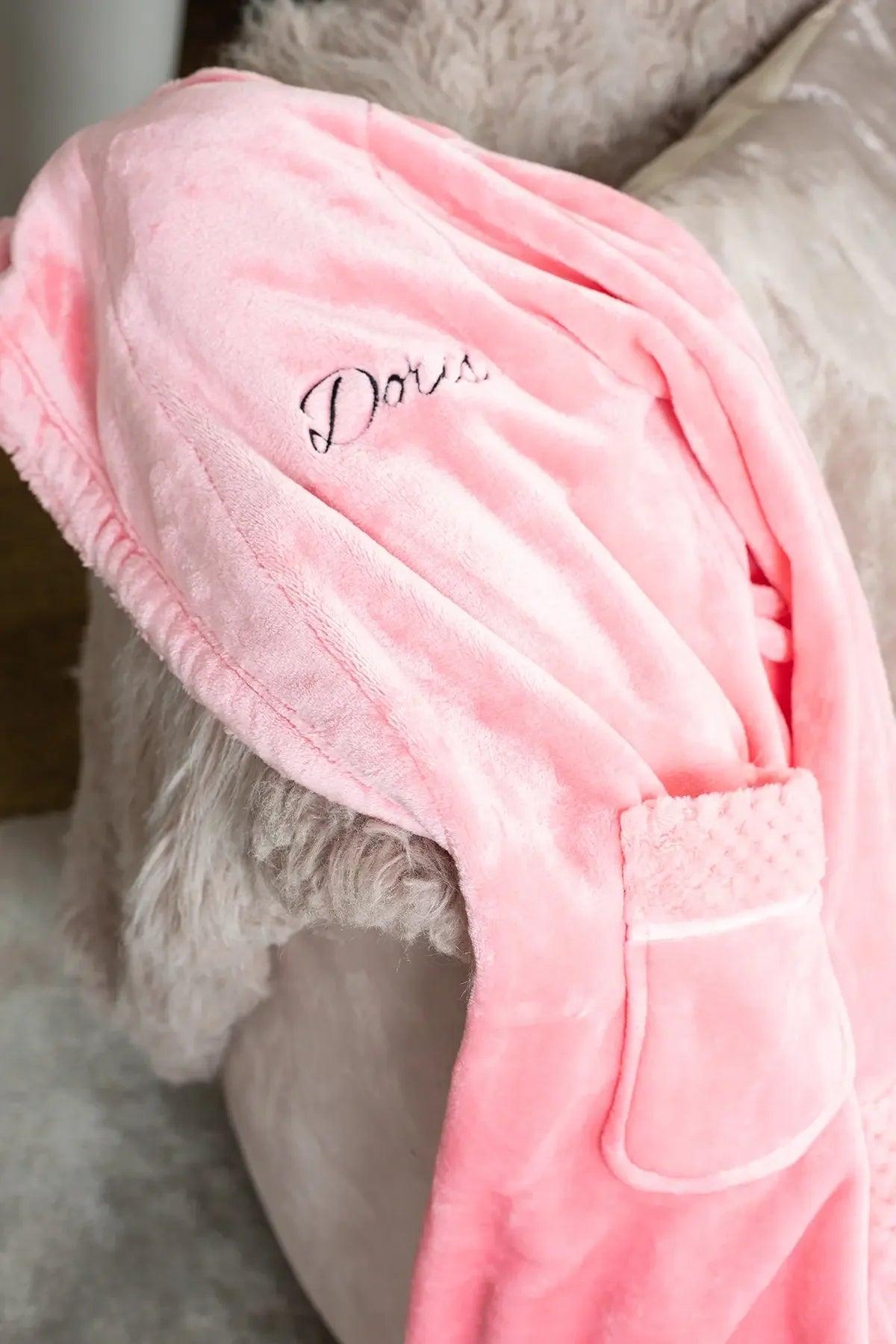 Women's ultra-soft plush bathrobe from Plush Fashion Hub, featuring a cozy, fluffy fabric and a relaxed fit for comfort.