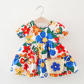 Girls' floral dress with matching bag from Trendy Attic Store01, featuring colorful flower patterns and a comfortable fit.