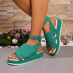 Women's platform ankle strap comfort sandals by Trendsi, featuring faux leather material and casual shoe design.