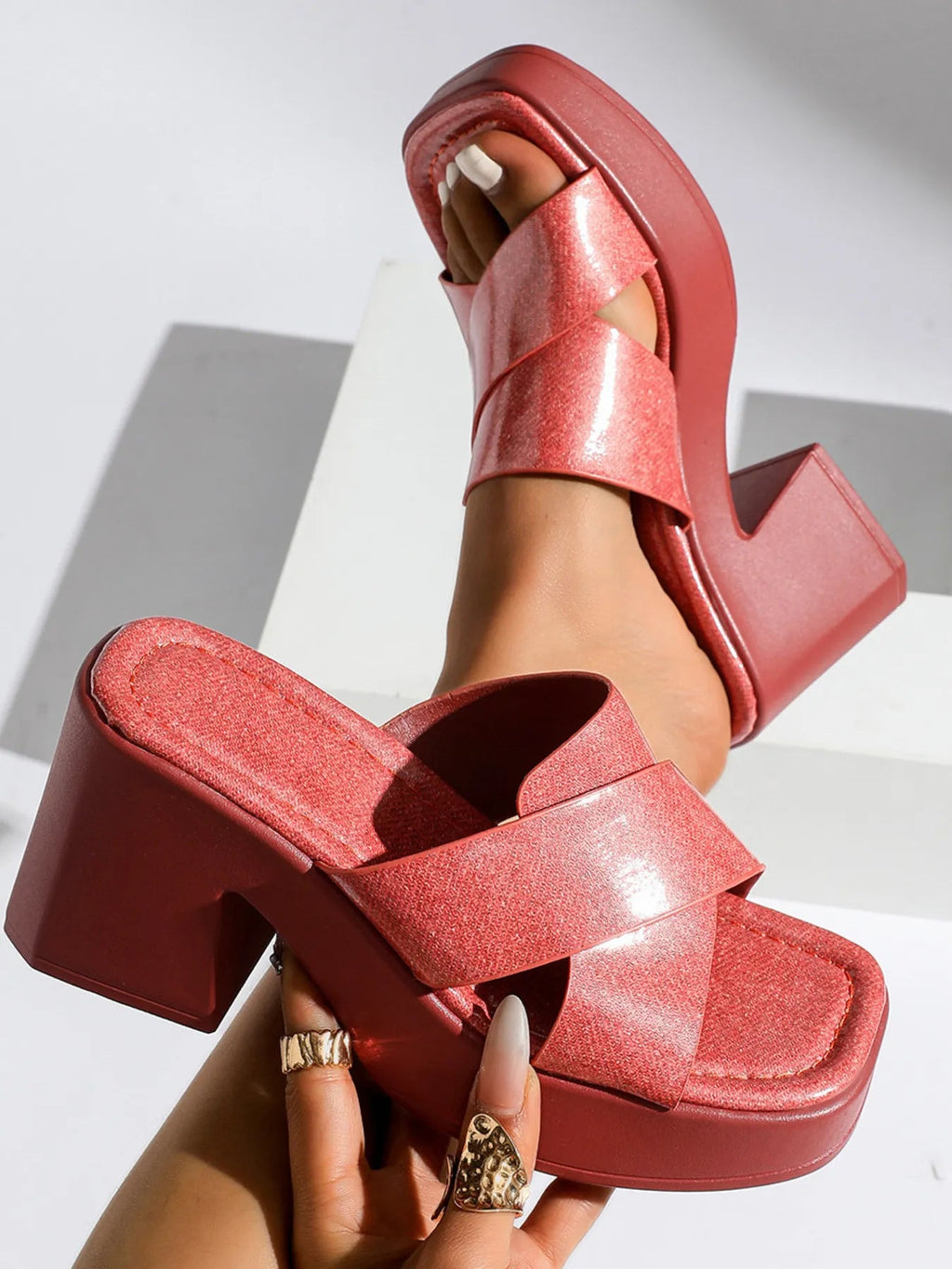 Women's platform block heel slide sandals in sleek PU leather, featuring a modern design and open-toe style.