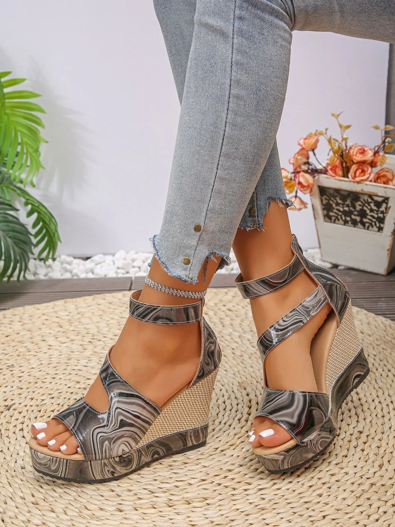Women's chic platform wedge sandals with ankle straps made of faux leather, featuring stylish design and comfortable fit.