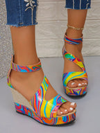 Women's faux leather platform wedge sandals with ankle strap, trendy and stylish shoe by Trendsi.