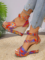 Women's faux leather platform wedge sandals with ankle strap by Trendsi, stylish shoes with a chunky heel and trendy design.