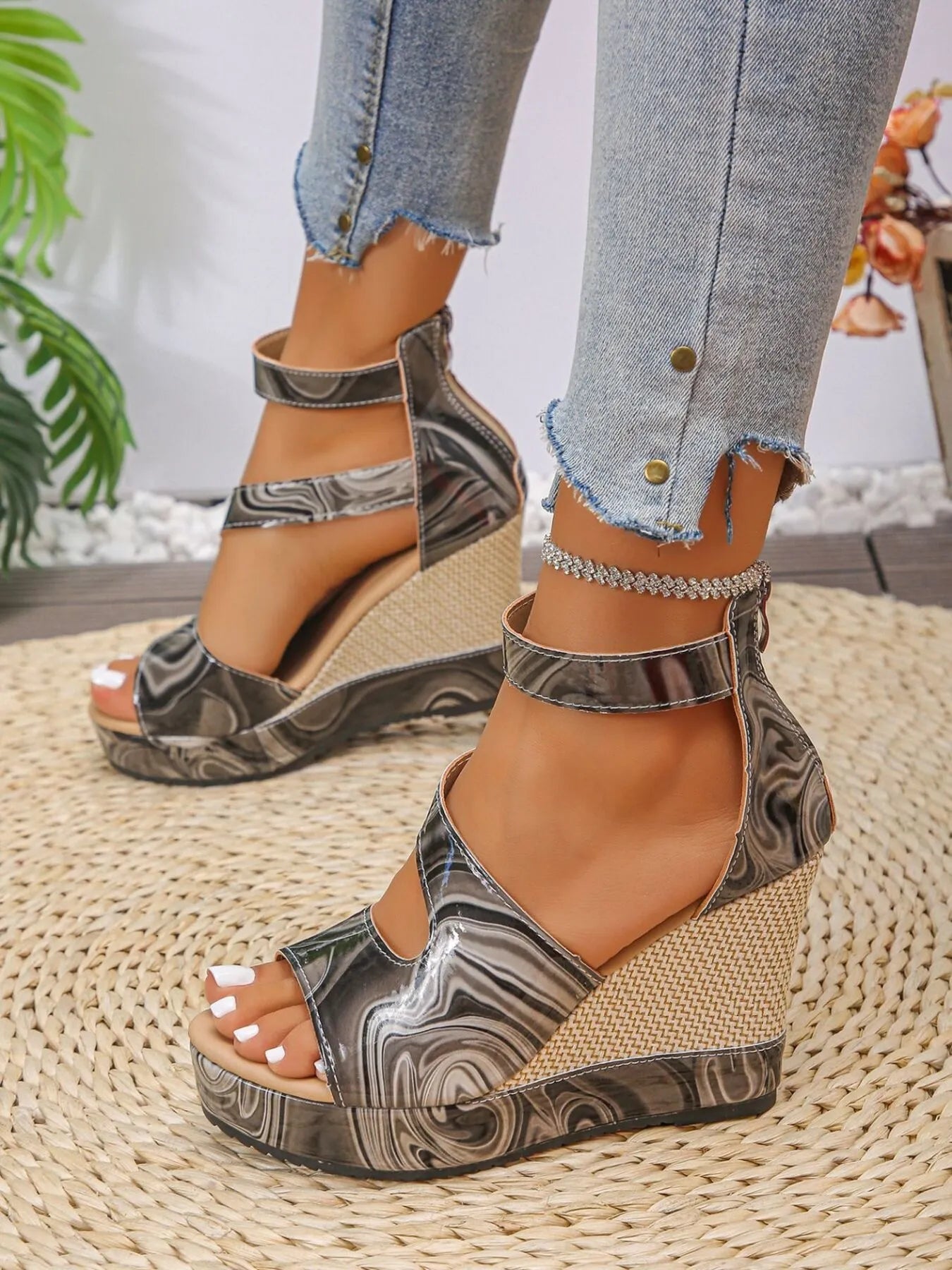 Women's faux leather platform wedge sandals with ankle strap from Trendsi, featuring a stylish and comfortable shoe design.