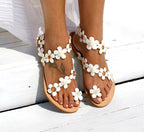Plus size Roman flat floral pullover slippers from Plush Fashion Hub, featuring a cozy design with colorful floral patterns.