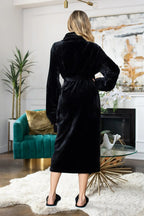 Women's ultra-soft plush bathrobe from Plush Fashion Hub, featuring cozy, luxurious fabric and a relaxed fit for comfort.