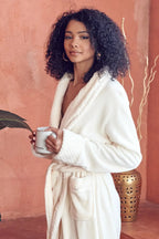 Women's ultra-soft plush bathrobe from Plush Fashion Hub featuring a cozy, fluffy design and a comfortable fit.