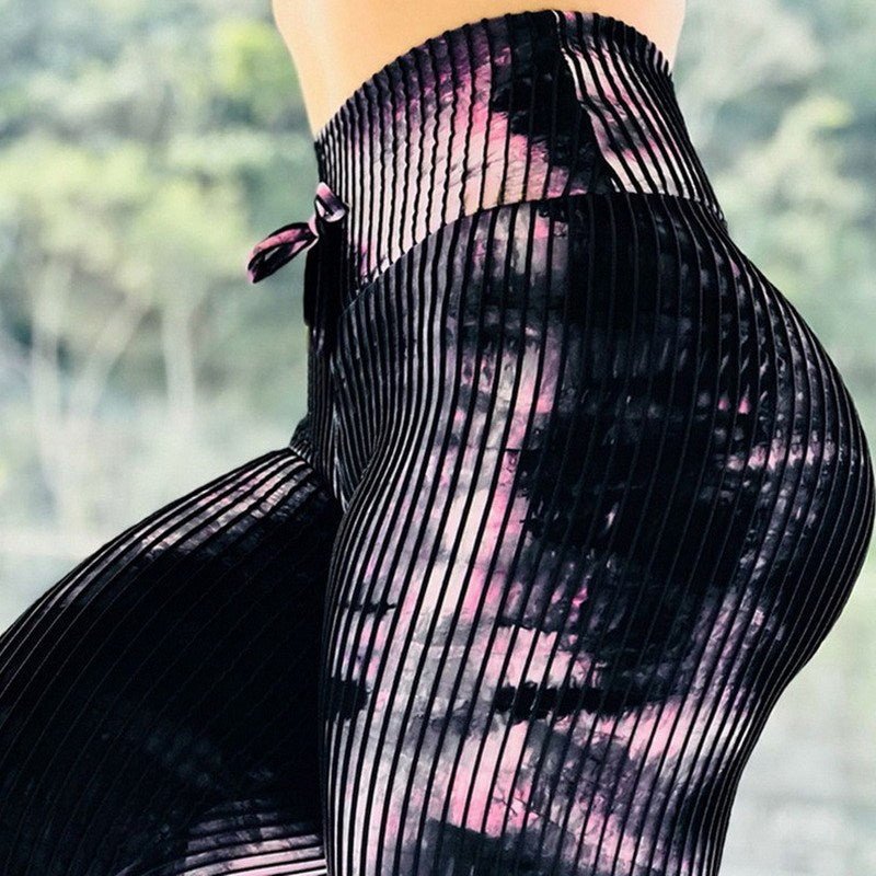 Printed high-waist stretchy leggings by Plush Fashion Hub, stylish casualwear for comfortable and fashionable workout or everyday wear.