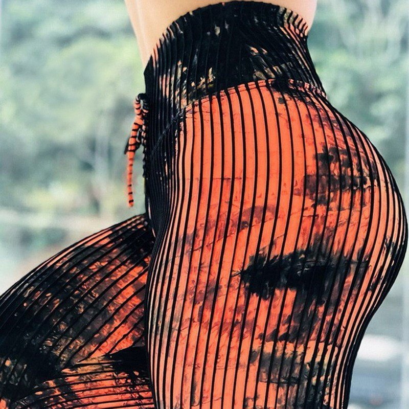 Printed high-waist leggings by Plush Fashion Hub, stretchy and stylish casualwear perfect for workouts and everyday wear.
