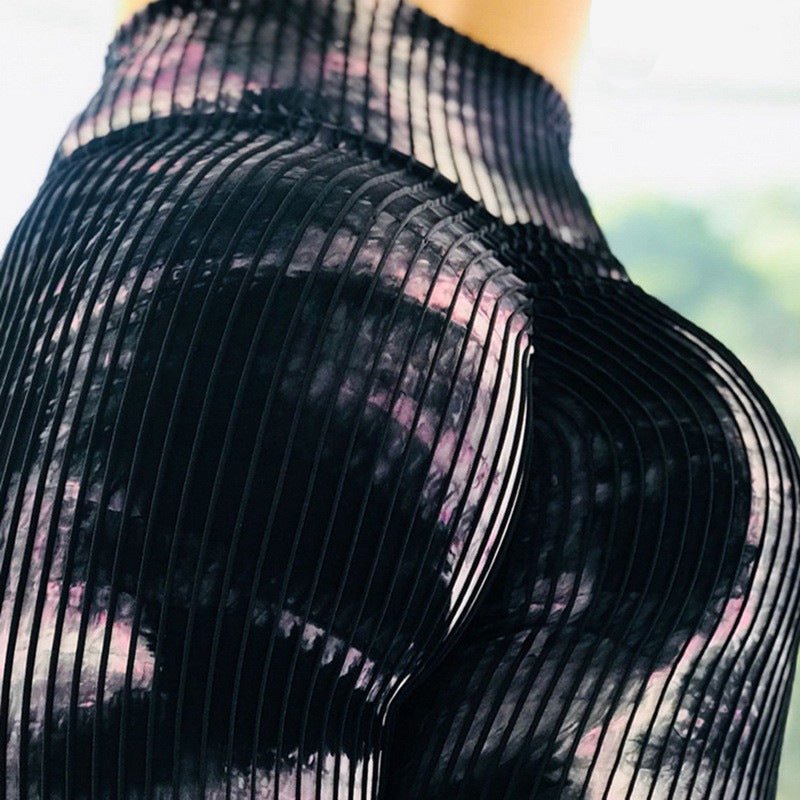 Printed high-waist leggings from Plush Fashion Hub, showcasing stretchy, stylish casualwear perfect for workout and everyday wear.