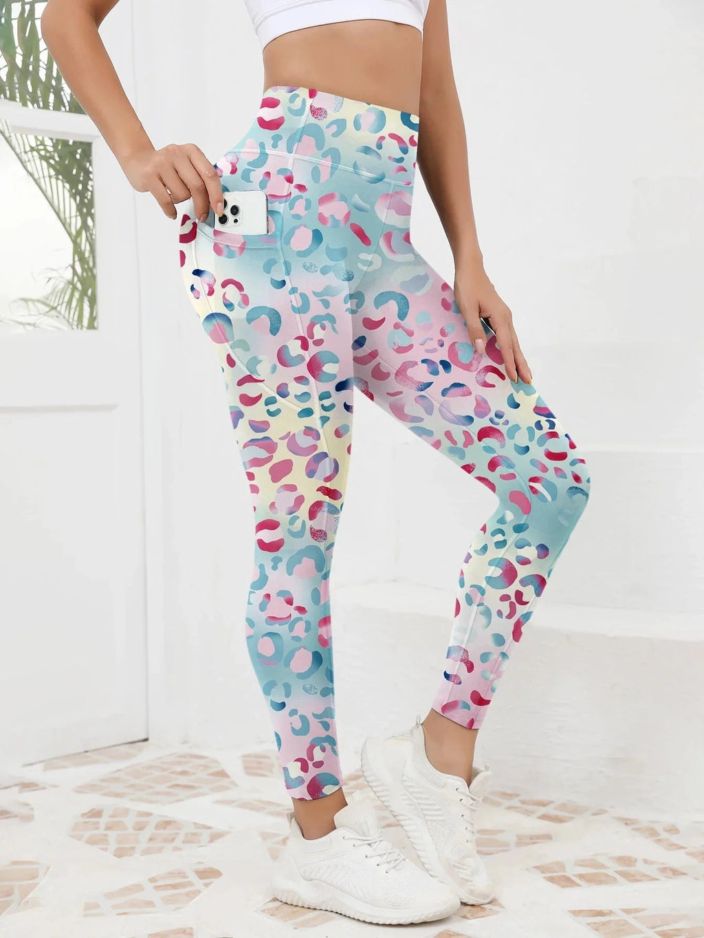 Women’s printed high-waist pocket fitness leggings by FitiqueFit, featuring a stylish pattern and comfortable stretch fabric.