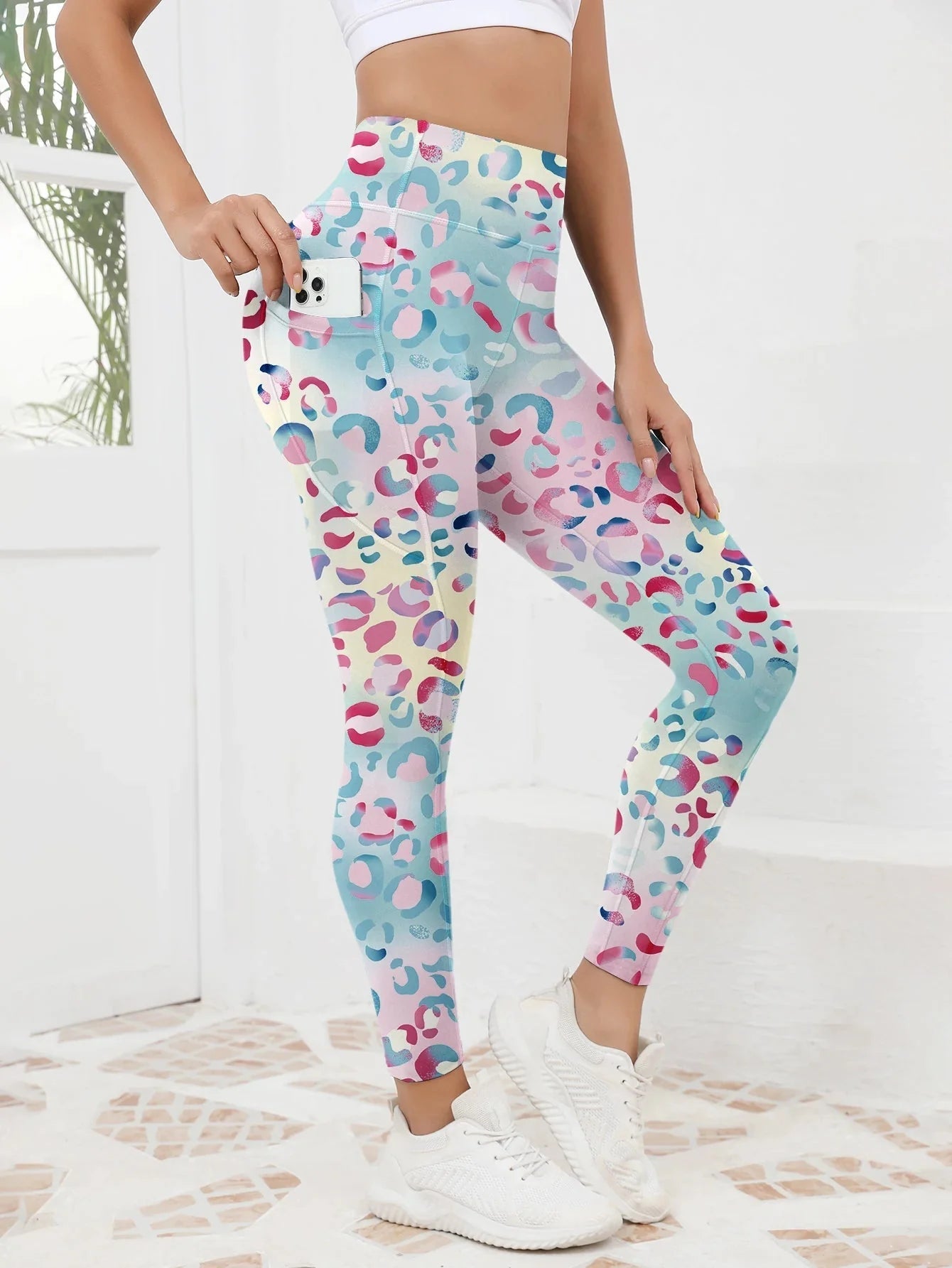 Women’s printed high-waist pocket fitness leggings by FitiqueFit, featuring a stylish pattern and comfortable stretch fabric.