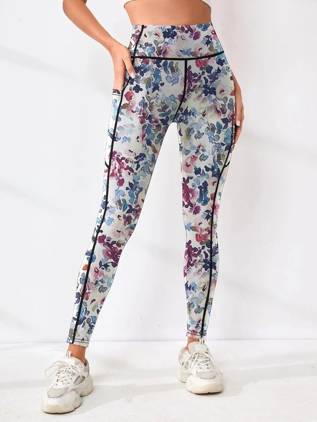 Printed high-waist fitness leggings for women with pockets by FitiqueFit, showcasing a colorful, stylish design and comfortable fit.