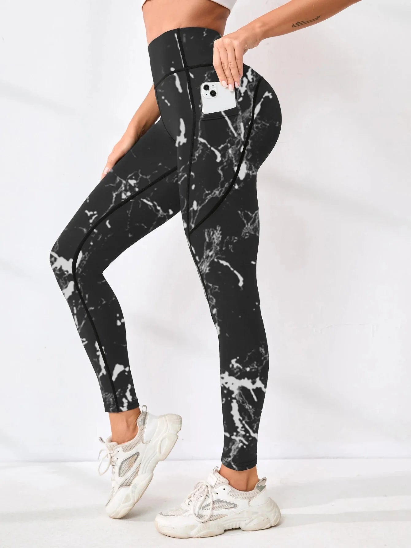 Women’s printed high-waist pocket leggings by FitiqueFit, featuring a colorful pattern and comfortable fit for active wear.