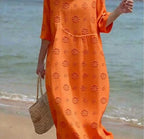 Printed ladies' long-sleeved round neck dress by Plush Fashion Hub, featuring a stylish floral pattern and comfortable fit.