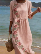 Printed ladies' long-sleeved round neck dress by Plush Fashion Hub, showcasing a stylish pattern and comfortable fit.