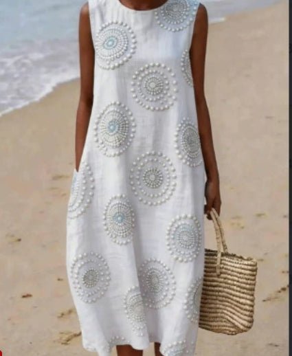 Printed ladies' long-sleeved round neck dress by Plush Fashion Hub, featuring a stylish floral print and comfortable fit.