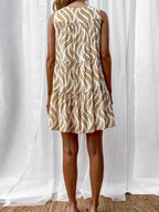 Women’s printed V-neck sleeveless A-line mini dress, perfect for summer, featuring vibrant floral patterns and a stylish V-neck design.