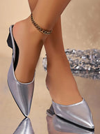 Women's pointed toe low heel sandals in faux leather with a chic design, perfect for dressy occasions.