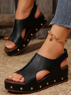 Women's studded PU leather wedge sandals featuring a comfortable casual design, perfect for summer wear.