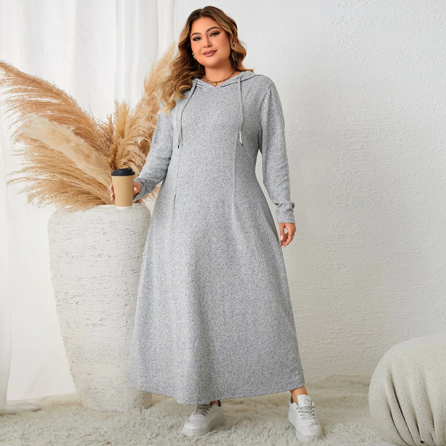 Plus size hooded A-line casual dress for women by Plush Fashion Hub, featuring a comfortable autumn-ready design.