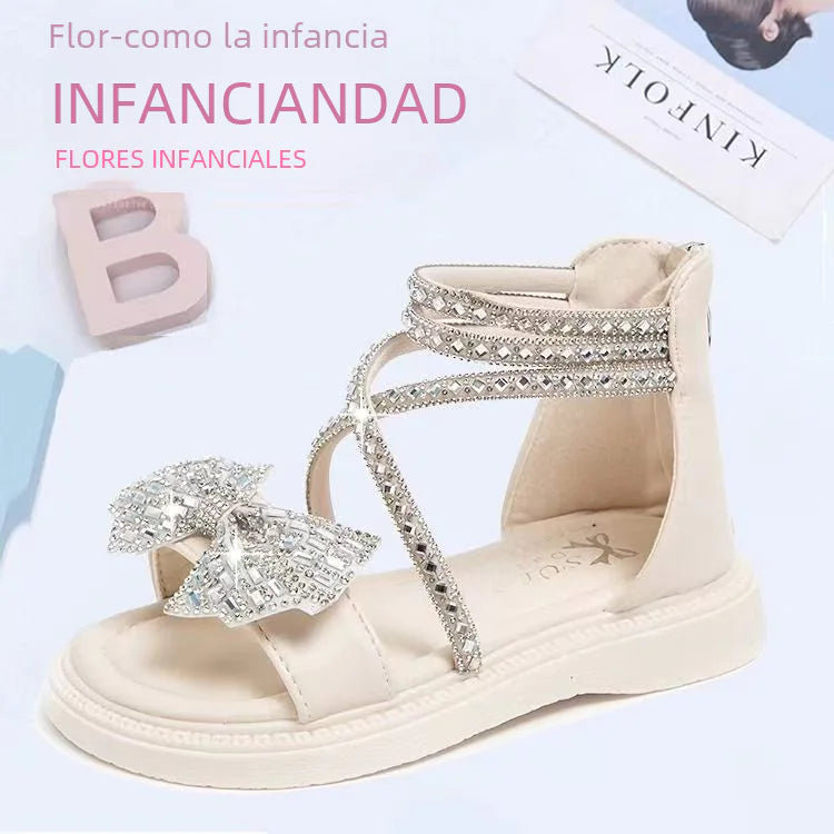 Girls' summer sandals with rhinestones by Trendy Attic Store01, featuring open-toe design and colorful straps for warm-weather style.