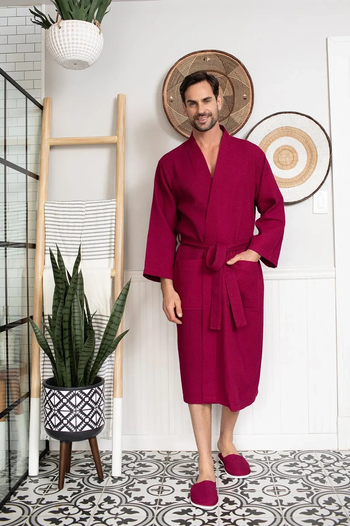 Red men's waffle spa bathrobe by Plush Fashion Hub, lightweight and absorbent, shown hanging on a hook.