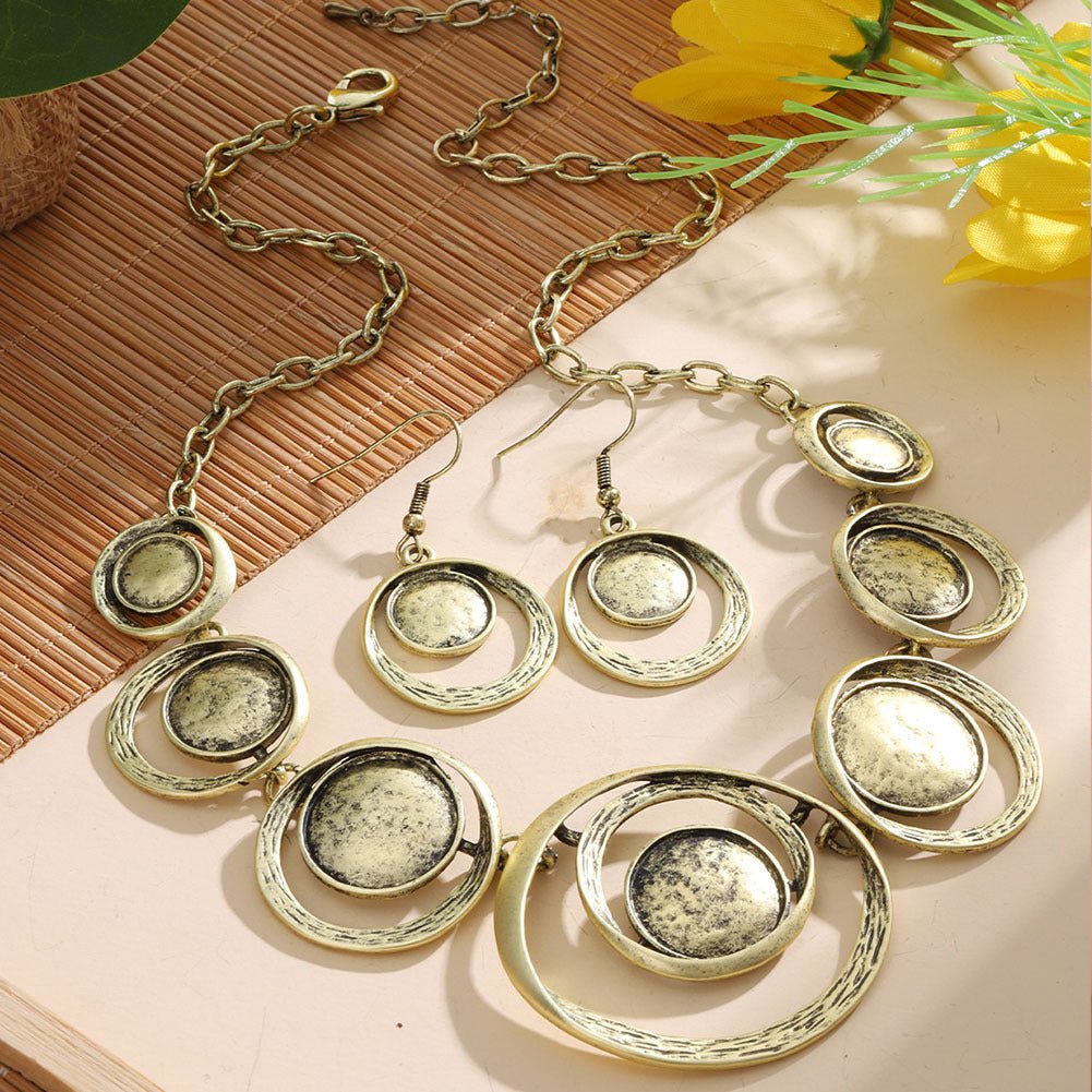 Retro oil-dropped hollow round earrings and matching women's necklace from Plush Fashion Hub, featuring stylish jewelry with a vintage look.