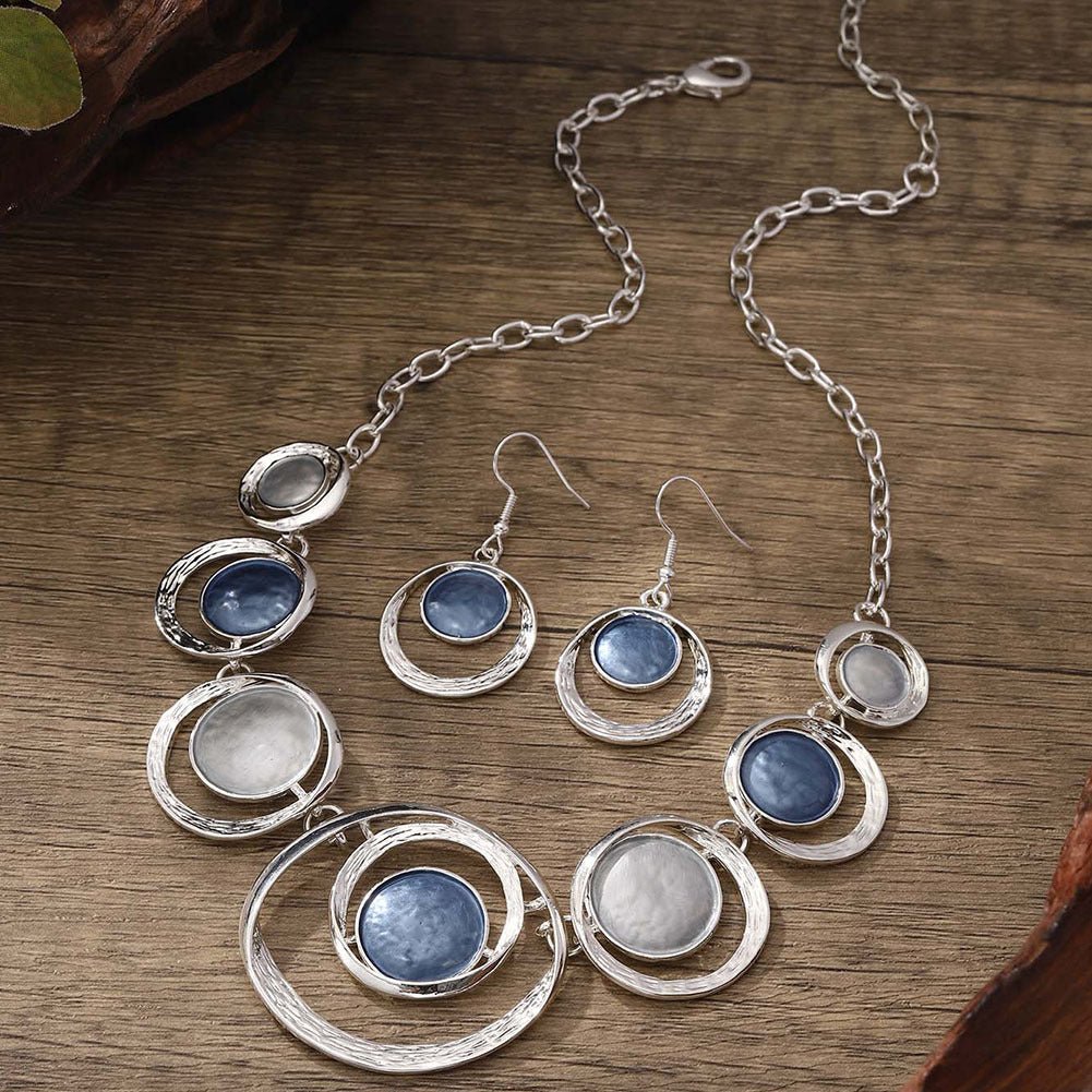 Retro oil-dropped hollow round earrings and matching necklace set for women, featuring stylish gold-tone jewelry from Plush Fashion Hub.