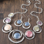 Retro oil-dropped hollow round earrings and women's necklace set by Plush Fashion Hub, featuring vintage-inspired gold-tone jewelry.
