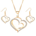 Double heart earrings and necklace wedding set by Trendy Attic Store01, featuring matching silver jewelry with heart-shaped charms.