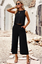 Women's linen blend lounge set featuring a round neck tank top and wide-leg pants, perfect for comfortable casual wear.