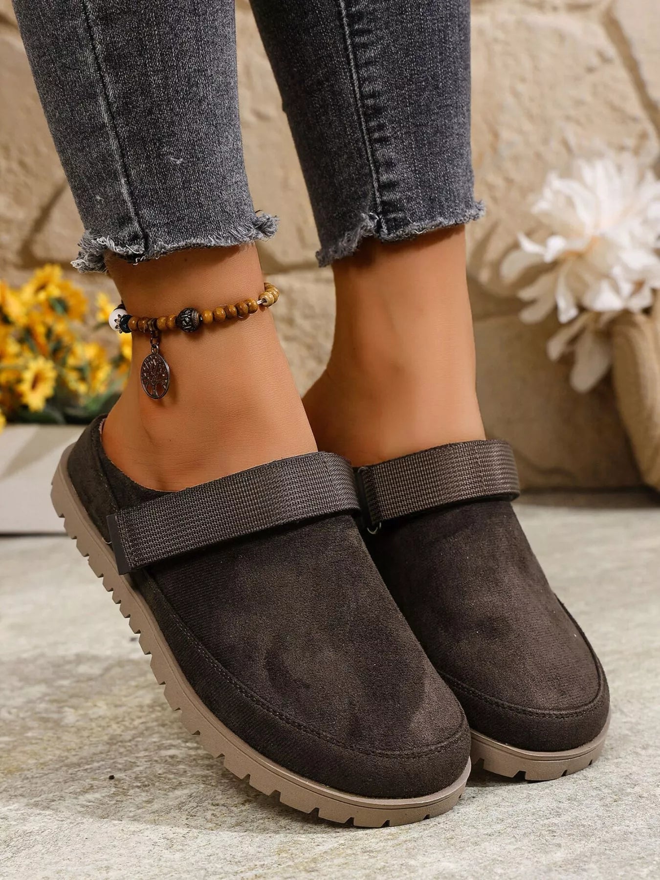 Women's round toe slip-on casual flats made of faux leather, featuring a comfortable and stylish design by Trendsi.
