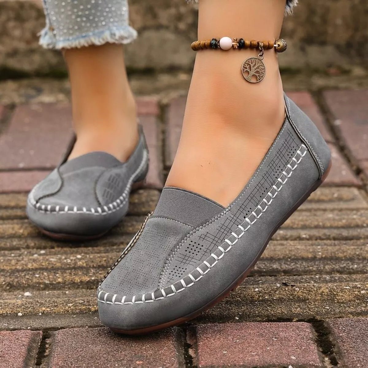 Women’s breathable mesh slip-on flats with round toes, comfortable walking shoes by Trendsi, ideal for casual wear and everyday comfort.