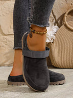 Women's round toe slip-on casual flats made of faux leather, featuring a comfortable and stylish design by Trendsi.