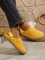 Women's round toe slip-on casual flats made of faux leather, designed for comfort and versatile everyday wear.