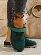 Women's round toe slip-on casual flats made of faux leather, featuring a comfortable and stylish design by Trendsi.