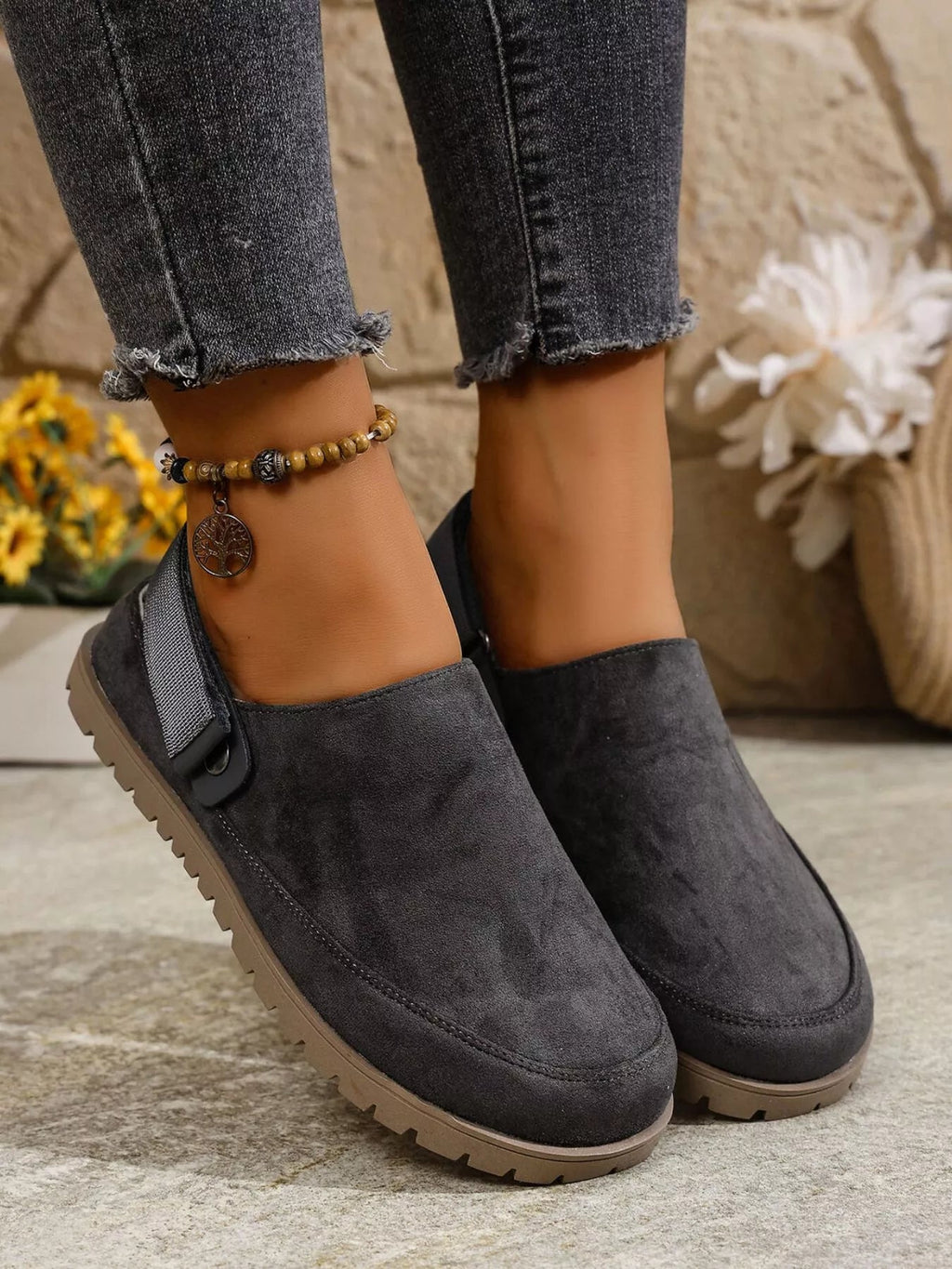 Women's round toe slip-on casual flats in faux leather, featuring a comfortable, easy-to-wear design by Trendsi.