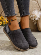 Women's round toe slip-on casual flats in faux leather, featuring a comfortable, easy-to-wear design by Trendsi.