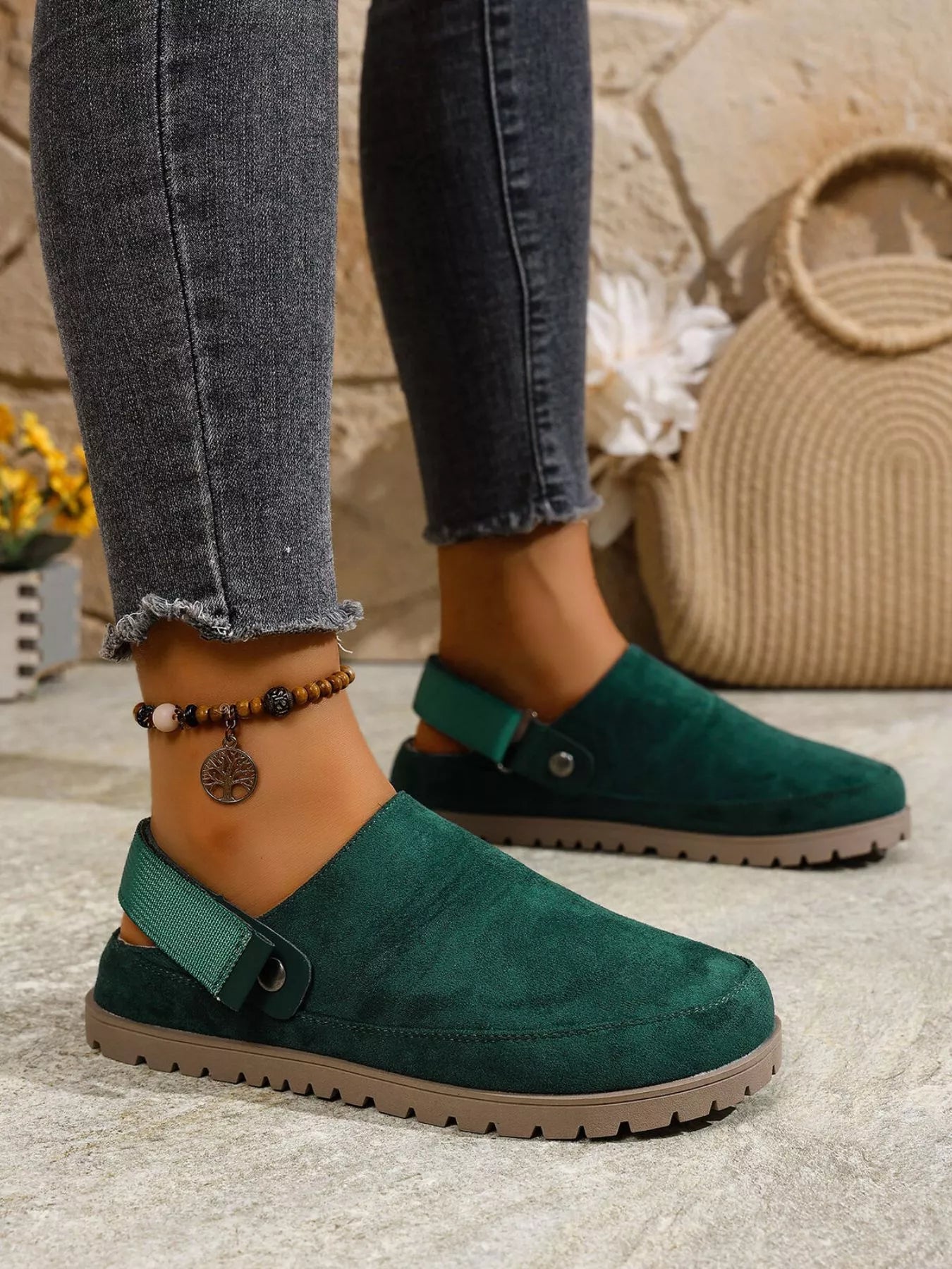 Women's round toe slip-on casual flats made of faux leather, featuring a comfortable and stylish design by Trendsi.