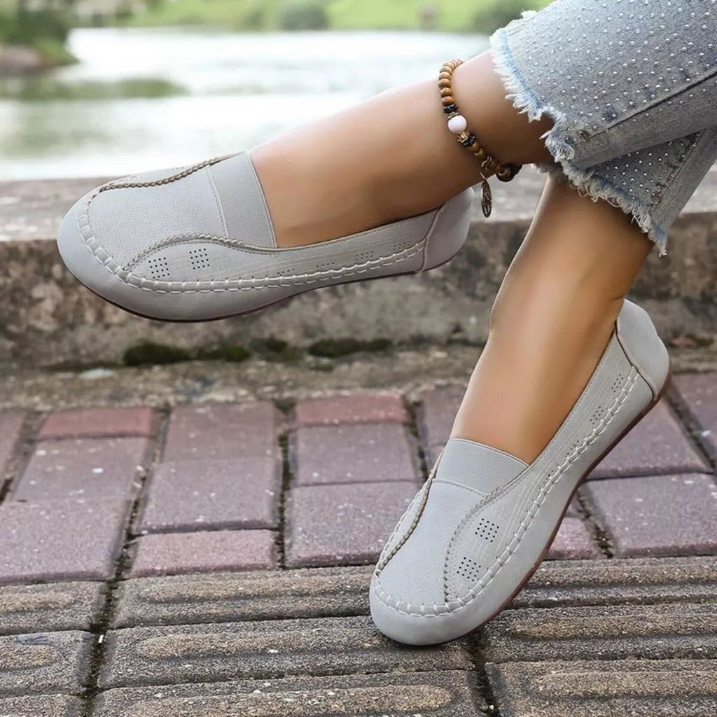Women's breathable mesh slip-on flats with round toes, designed for comfort and casual walking by Trendsi.