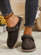 Women's round toe slip-on casual flats made of faux leather, designed for comfort and everyday style.