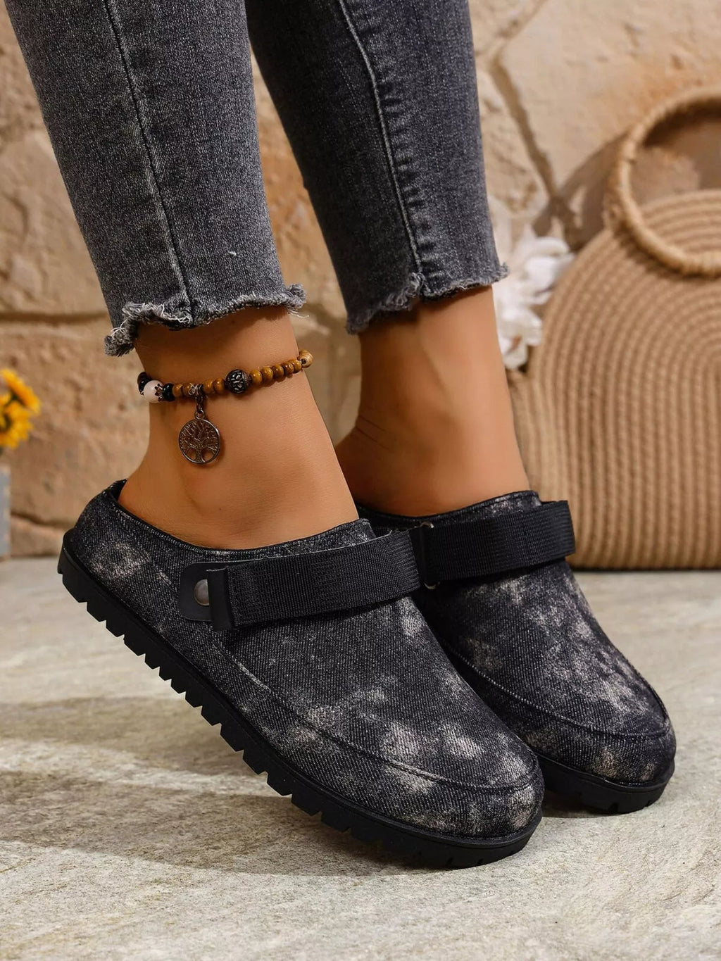 Women's round toe slip-on casual flats made of faux leather, featuring a comfortable and stylish design by Trendsi.