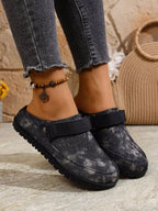 Women's round toe slip-on casual flats made of faux leather, featuring a comfortable and stylish design by Trendsi.