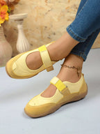 Women's faux leather and suede round toe loafers with Velcro strap, stylish slip-on shoe from Trendsi.